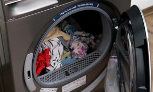 Tại sao quần áo không khô hẳn khi dùng máy giặt-sấy?